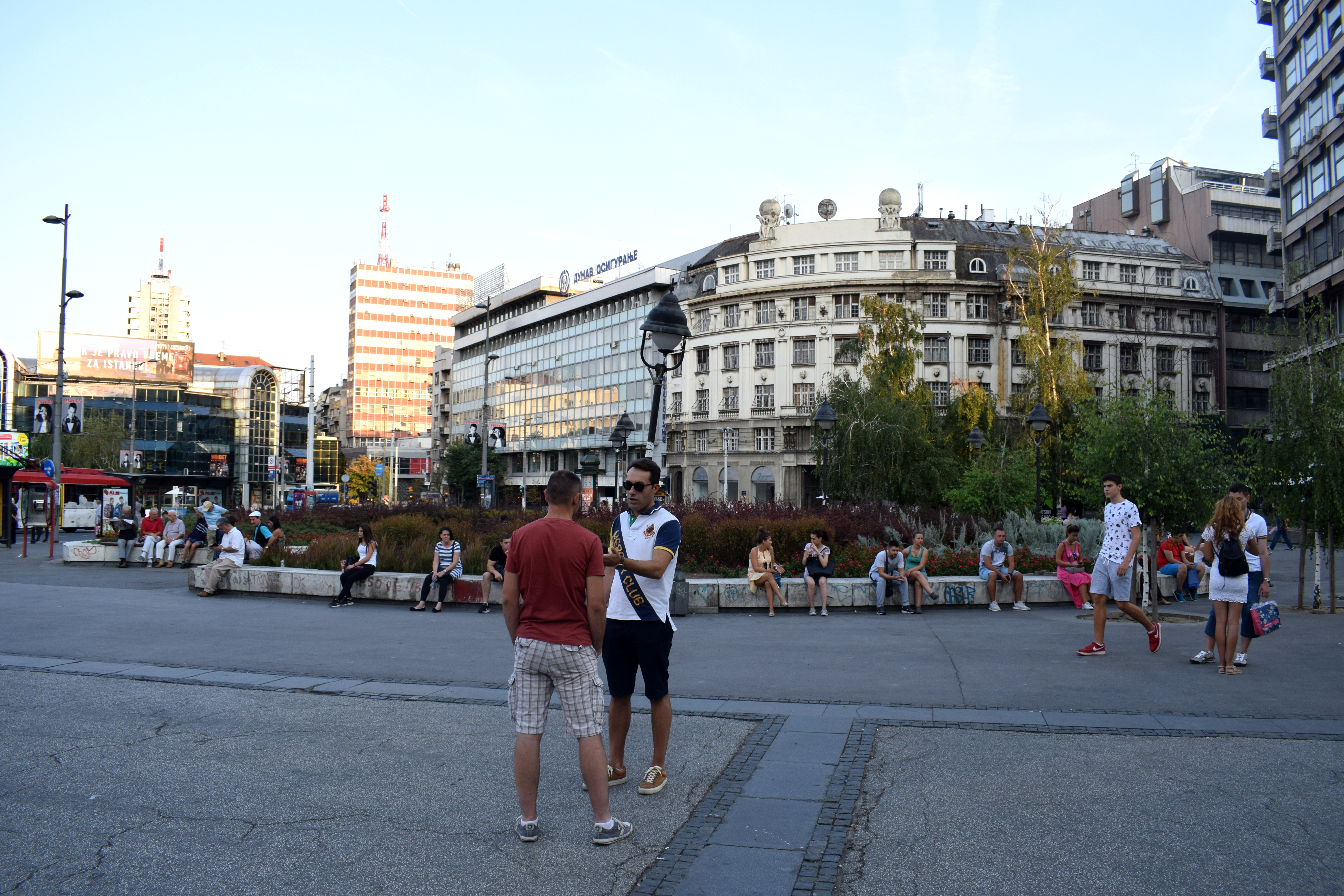 Two men standing on Republic Square in Belgrade, Serbia (Beograd, Srbija) 