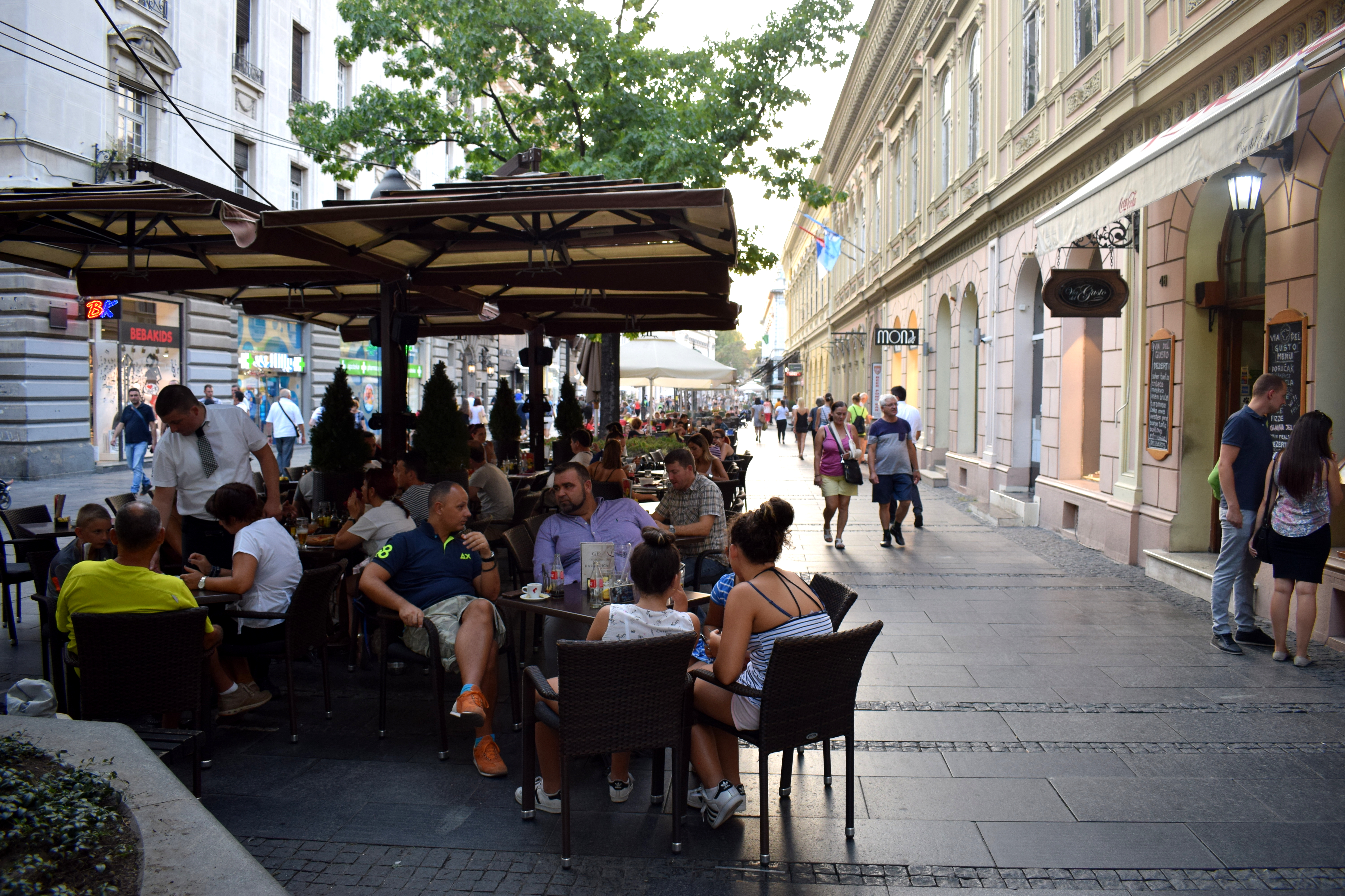 Serbs sitting at cafe on Knez Mihailova street in Belgrade, Serbia (Beograd, Srbija) 